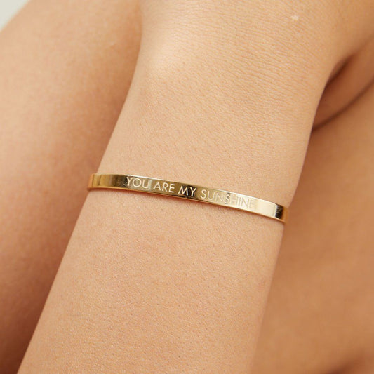 Gold engraved cuff bracelet